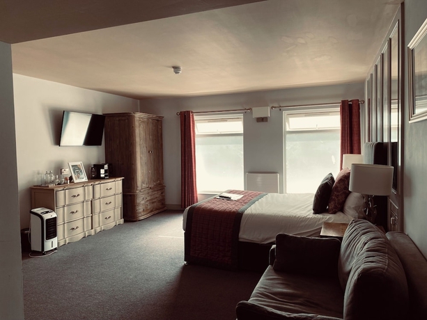 Imagen de la habitación del Hotel The Suffolk. Foto 5