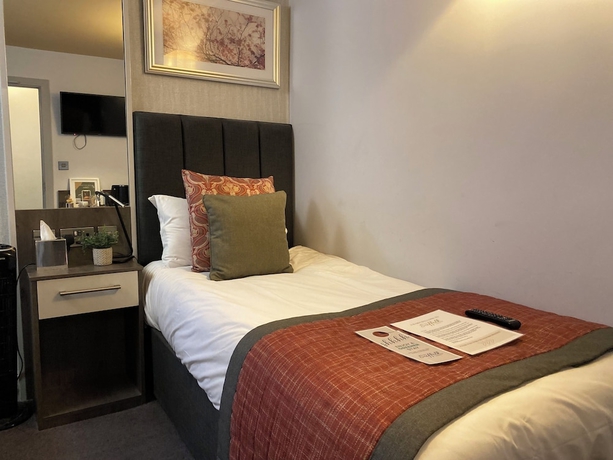 Imagen de la habitación del Hotel The Suffolk. Foto 7