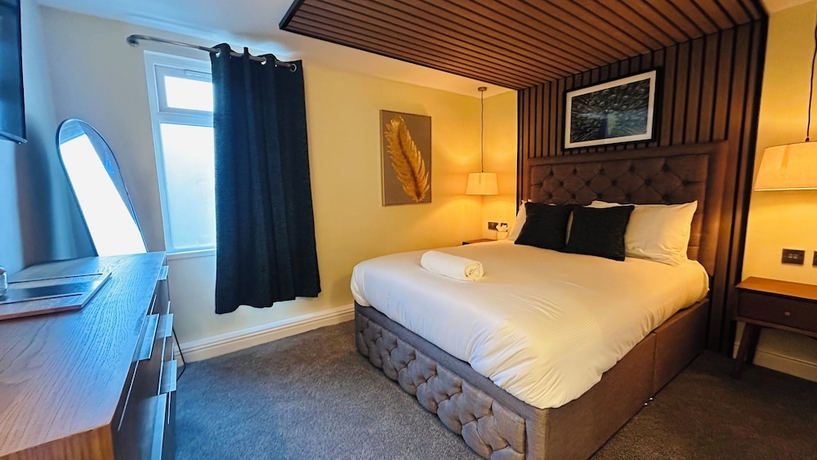 Imagen de la habitación del Hotel The Suffolk. Foto 12