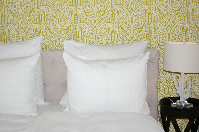 Imagen de la habitación del Hotel The Suite Garden. Foto 2