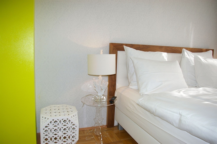 Imagen de la habitación del Hotel The Suite Garden. Foto 5