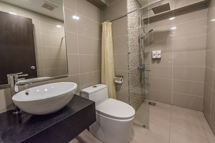 Imagen de la habitación del Hotel The Suitel. Foto 5