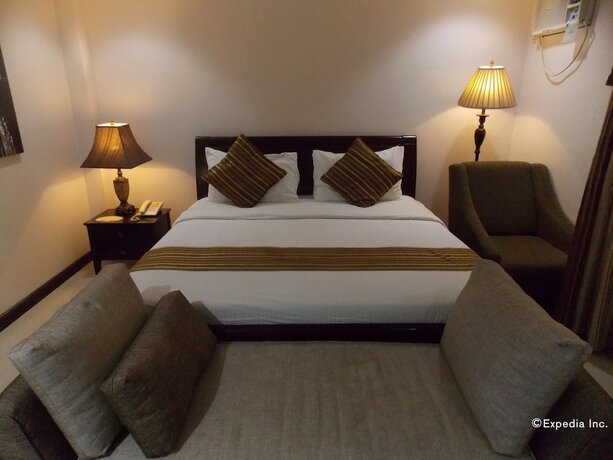 Imagen de la habitación del Hotel The Suites At Calle Nueva. Foto 28