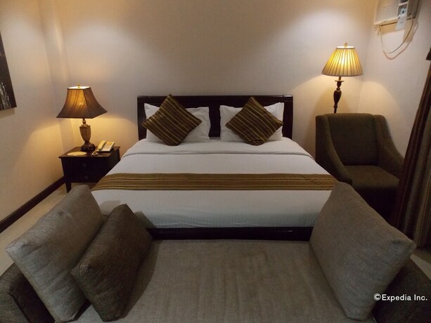 Imagen de la habitación del Hotel The Suites At Calle Nueva. Foto 29
