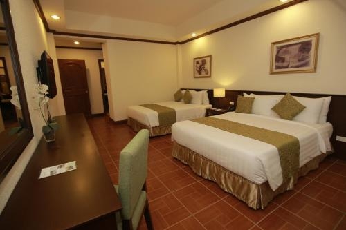 Imagen de la habitación del Hotel The Suites At Mount Malarayat. Foto 7