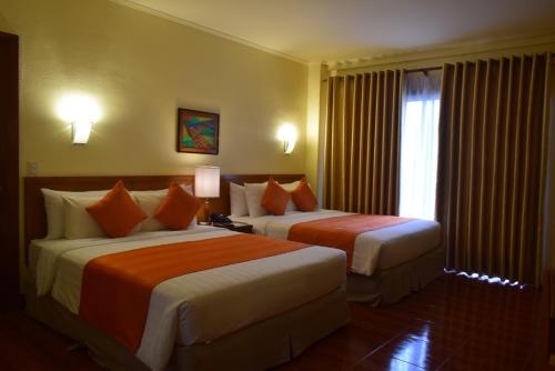 Imagen de la habitación del Hotel The Suites At Mount Malarayat. Foto 9