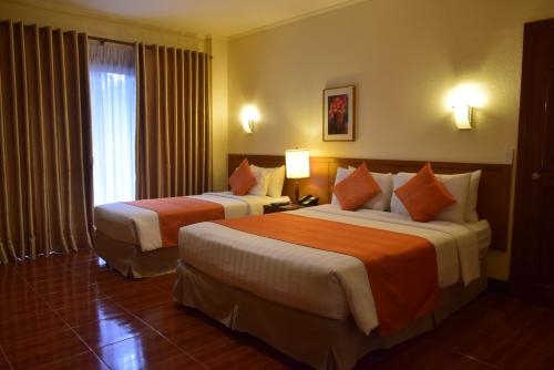 Imagen de la habitación del Hotel The Suites At Mount Malarayat. Foto 10