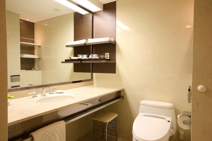 Imagen de la habitación del Hotel The Suites Hotel Jeju. Foto 5