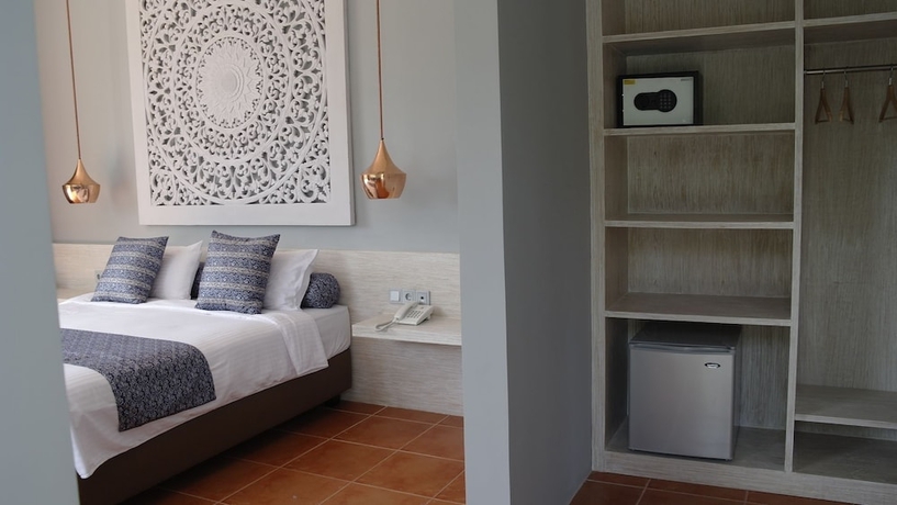 Imagen de la habitación del Hotel The Suites Lombok. Foto 2