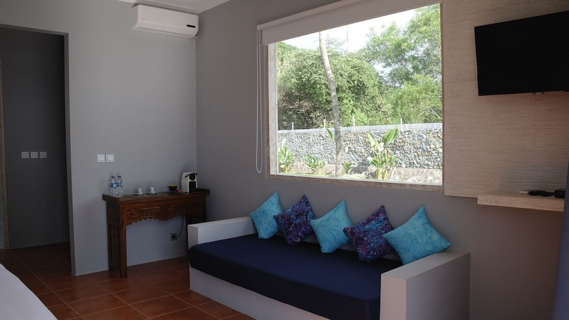 Imagen de la habitación del Hotel The Suites Lombok. Foto 7