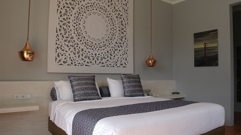 Imagen de la habitación del Hotel The Suites Lombok. Foto 8