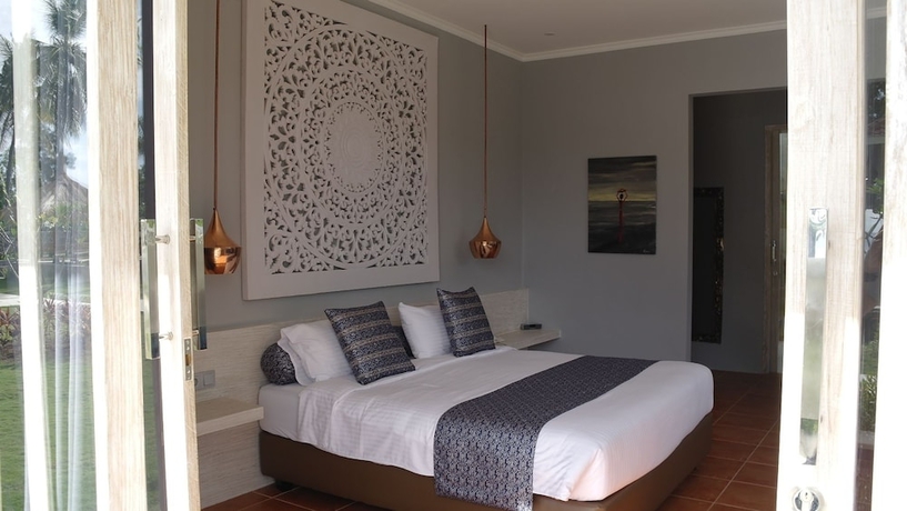 Imagen de la habitación del Hotel The Suites Lombok. Foto 10