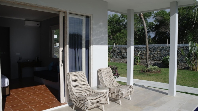 Imagen de la habitación del Hotel The Suites Lombok. Foto 12