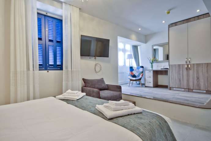 Imagen de la habitación del Hotel The Suites - Piazza Kirkop. Foto 17