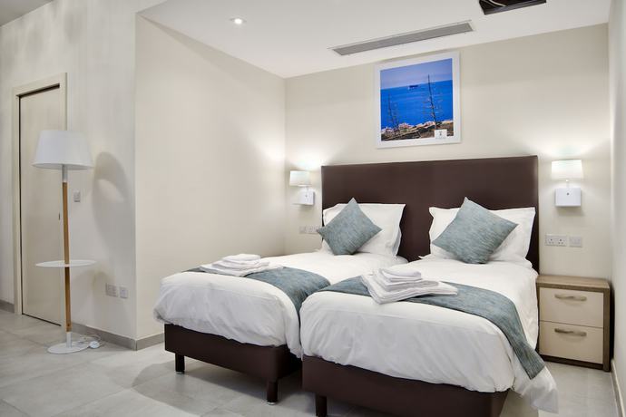 Imagen de la habitación del Hotel The Suites - Piazza Kirkop. Foto 18