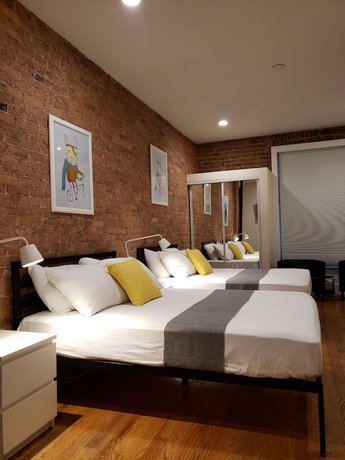 Imagen de la habitación del Hotel The Suites at central NYC. Foto 2