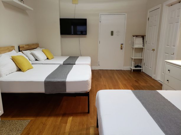 Imagen de la habitación del Hotel The Suites at central NYC. Foto 3