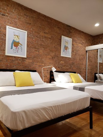 Imagen de la habitación del Hotel The Suites at central NYC. Foto 4