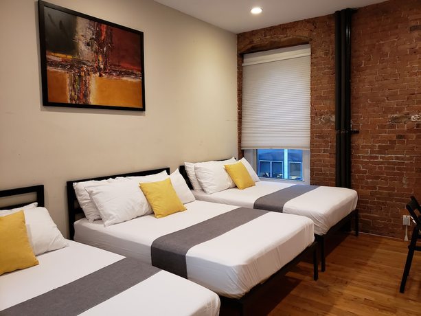 Imagen de la habitación del Hotel The Suites at central NYC. Foto 6
