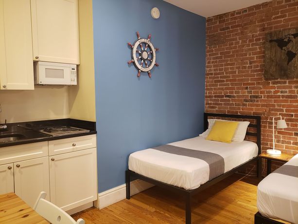 Imagen de la habitación del Hotel The Suites at central NYC. Foto 11