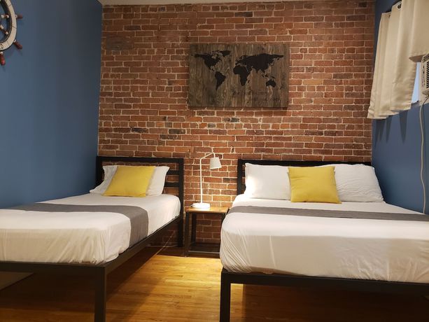 Imagen de la habitación del Hotel The Suites at central NYC. Foto 14