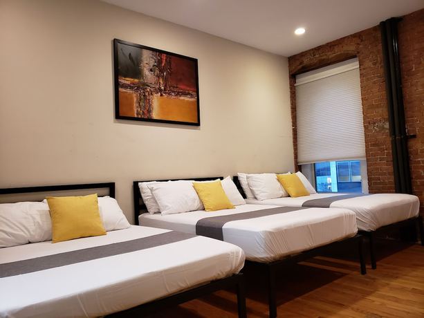 Imagen de la habitación del Hotel The Suites at central NYC. Foto 17