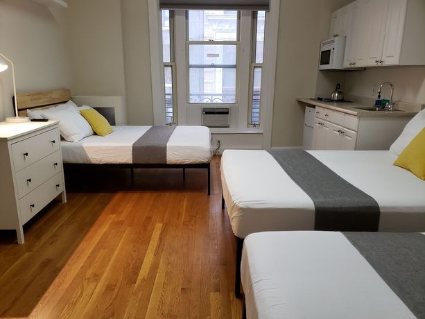 Imagen de la habitación del Hotel The Suites at central NYC. Foto 18