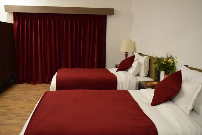 Imagen de la habitación del Hotel The Sultan Resort. Foto 15