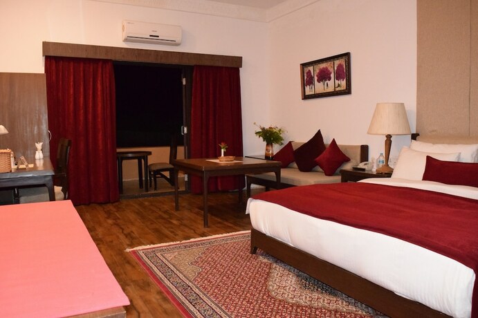 Imagen de la habitación del Hotel The Sultan Resort. Foto 19