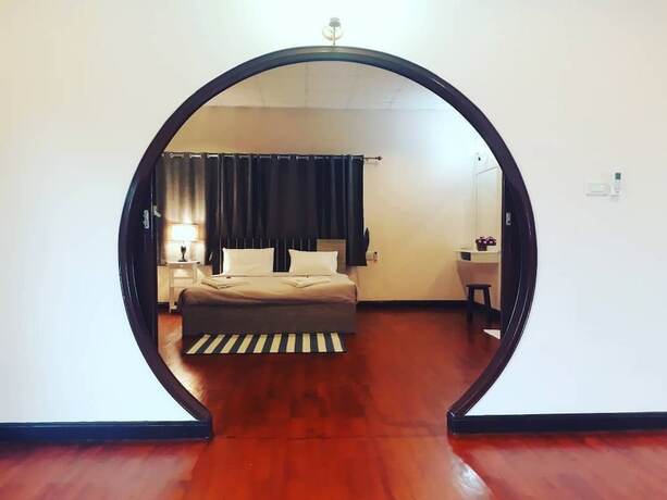 Imagen de la habitación del Hotel The Sun House. Foto 14