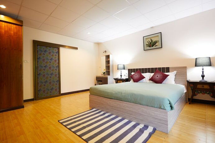 Imagen de la habitación del Hotel The Sun House. Foto 30