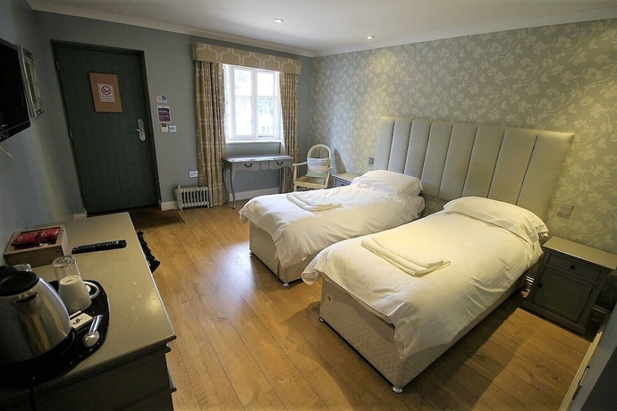 Imagen de la habitación del Hotel The Sun Inn, SWINDON. Foto 2