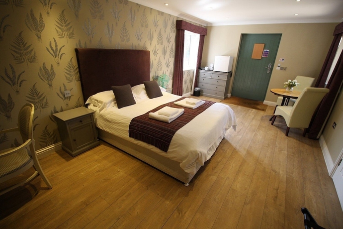 Imagen de la habitación del Hotel The Sun Inn, SWINDON. Foto 4