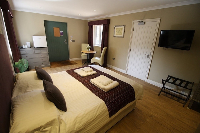 Imagen de la habitación del Hotel The Sun Inn, SWINDON. Foto 5