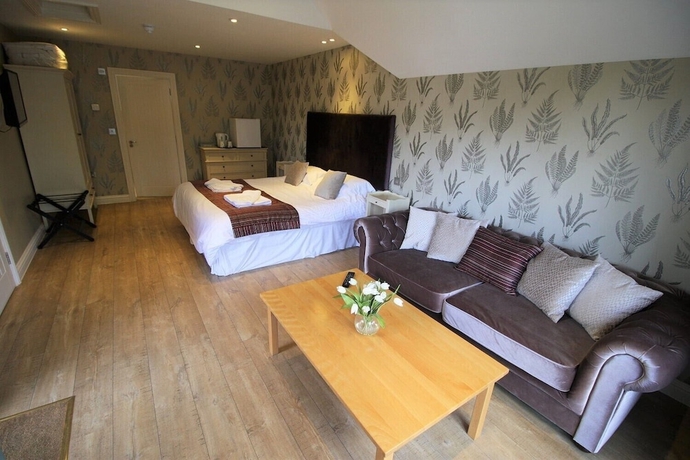 Imagen de la habitación del Hotel The Sun Inn, SWINDON. Foto 6