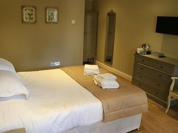 Imagen de la habitación del Hotel The Sun Inn, SWINDON. Foto 8