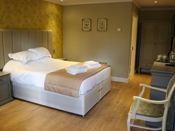 Imagen de la habitación del Hotel The Sun Inn, SWINDON. Foto 9