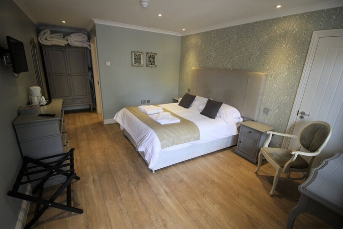 Imagen de la habitación del Hotel The Sun Inn, SWINDON. Foto 10