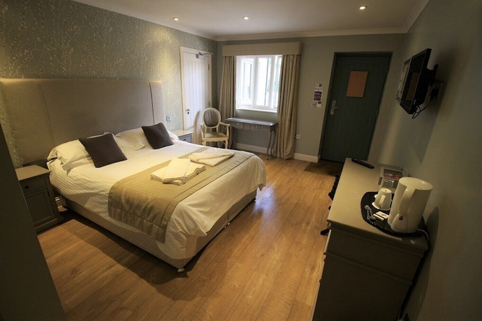 Imagen de la habitación del Hotel The Sun Inn, SWINDON. Foto 11