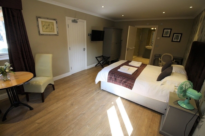Imagen de la habitación del Hotel The Sun Inn, SWINDON. Foto 12