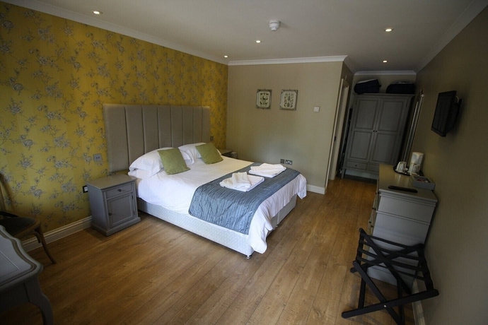 Imagen de la habitación del Hotel The Sun Inn, SWINDON. Foto 13