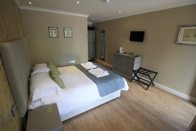 Imagen de la habitación del Hotel The Sun Inn, SWINDON. Foto 14
