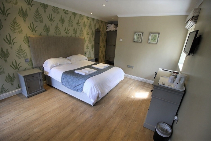Imagen de la habitación del Hotel The Sun Inn, SWINDON. Foto 15
