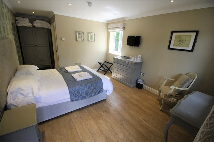 Imagen de la habitación del Hotel The Sun Inn, SWINDON. Foto 16