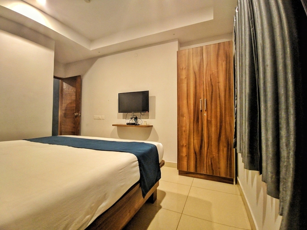 Imagen de la habitación del Hotel The Sun Suites. Foto 3