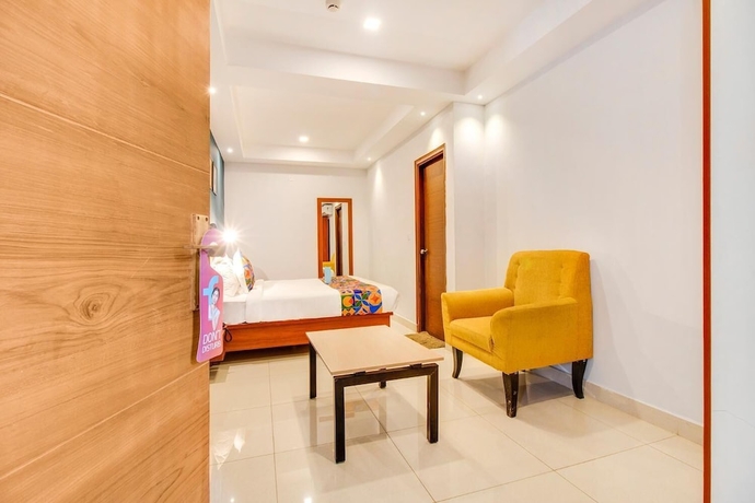 Imagen de la habitación del Hotel The Sun Suites. Foto 8