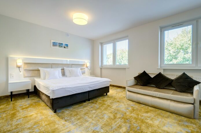 Imagen de la habitación del Hotel The Sun by Lubicz. Foto 18