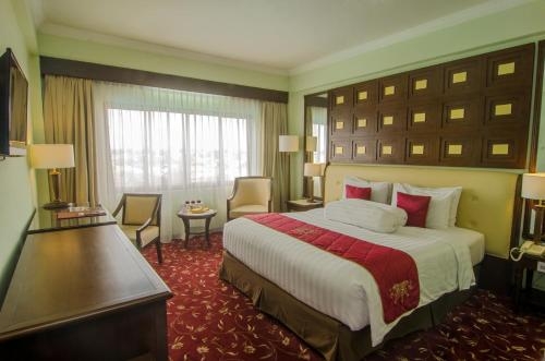 Imagen de la habitación del Hotel The Sunan Solo. Foto 6