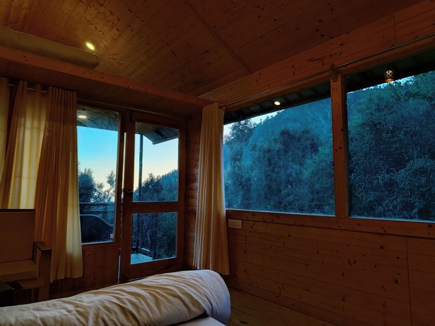 Imagen de la habitación del Hotel The Sunbird Retreat. Foto 9