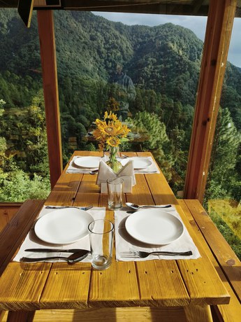 Imagen del bar/restaurante del Hotel The Sunbird Retreat. Foto 5